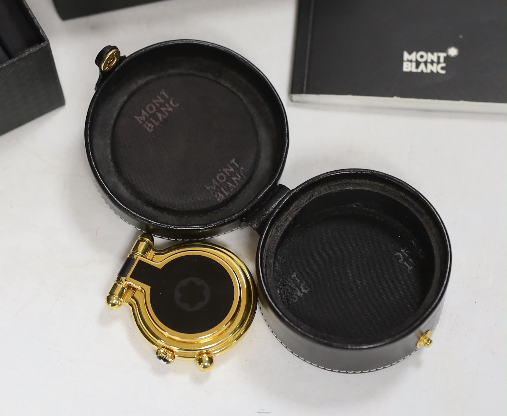 A cased Montblanc travelling timepiece with case and booklet